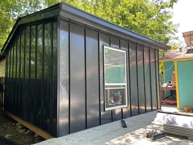 Black standing seam metal wall panels for Metal Roof Installation in Sandusky